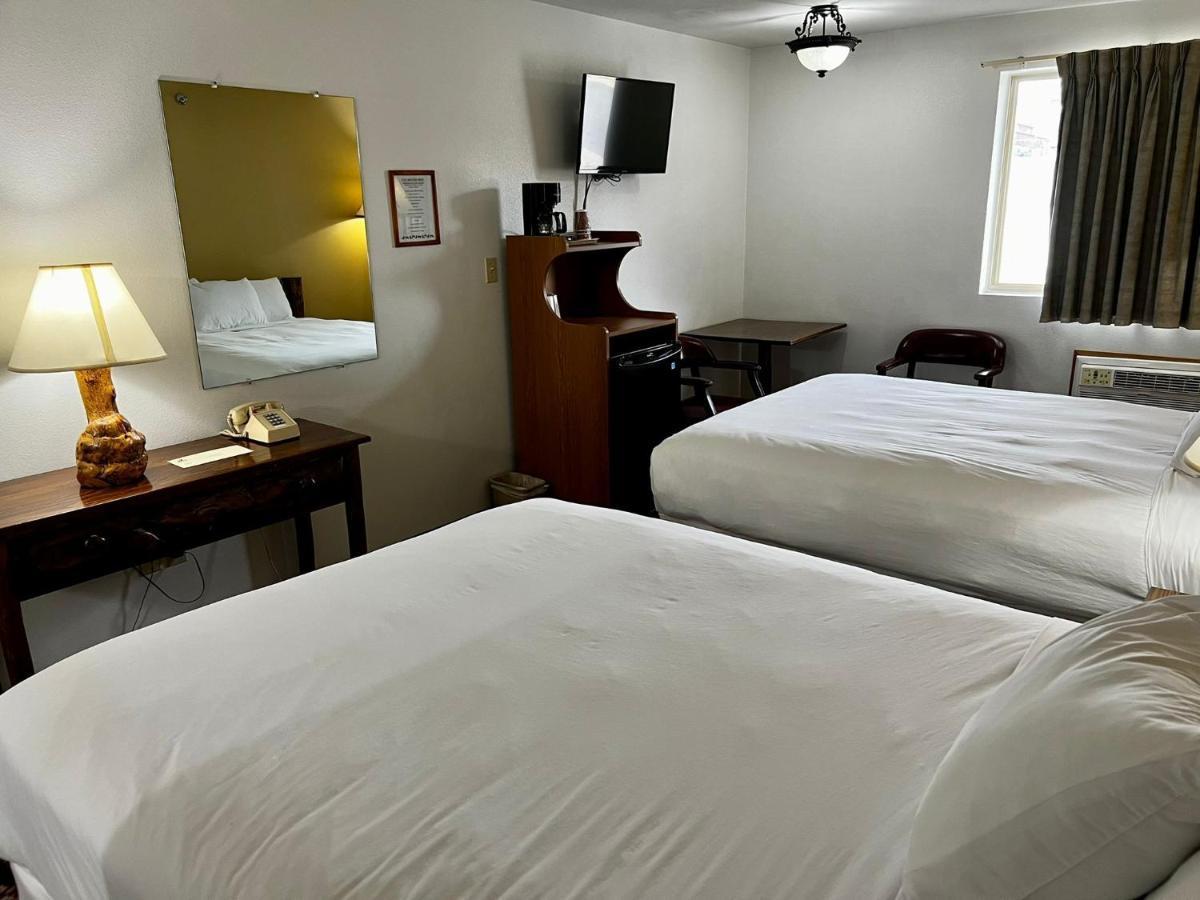 Kamer met 2 Queensize Bedden
