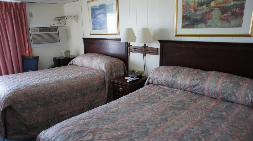 Queen Room with Two Queen Beds with Side Ocean View and Private Balcony