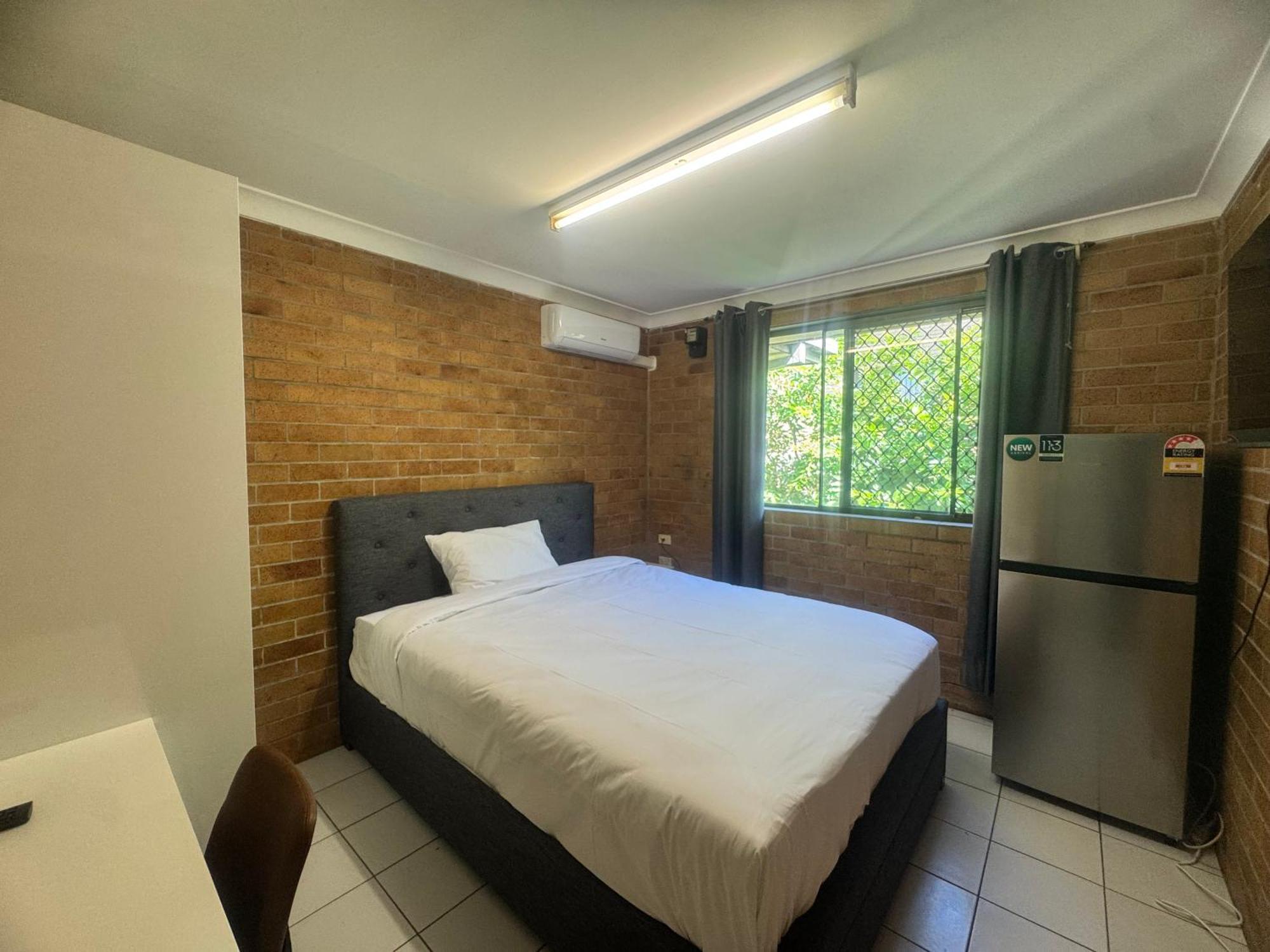 Queen Room with Shared Bathroom