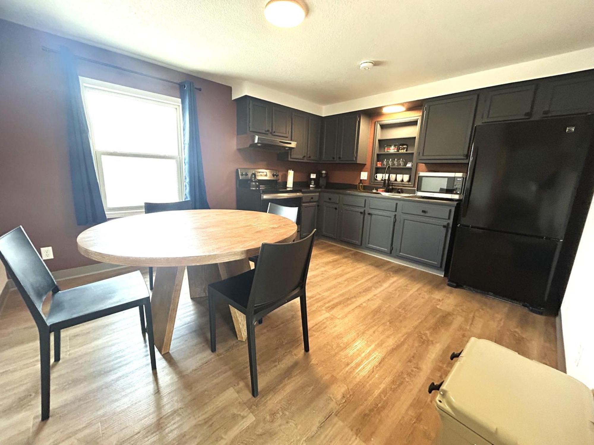 Two-Bedroom Suite with One King Bed, One Queen Bed, One Sofa Bed and Kitchen - No Elevator Access/Non-Smoking