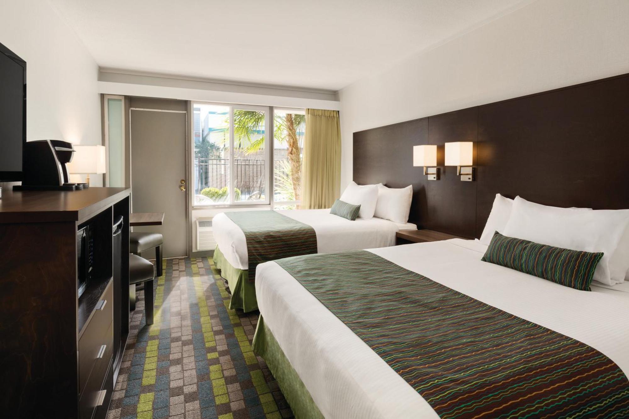 Superior Queen Room with Two Queen Beds and Pool View - Non-Smoking