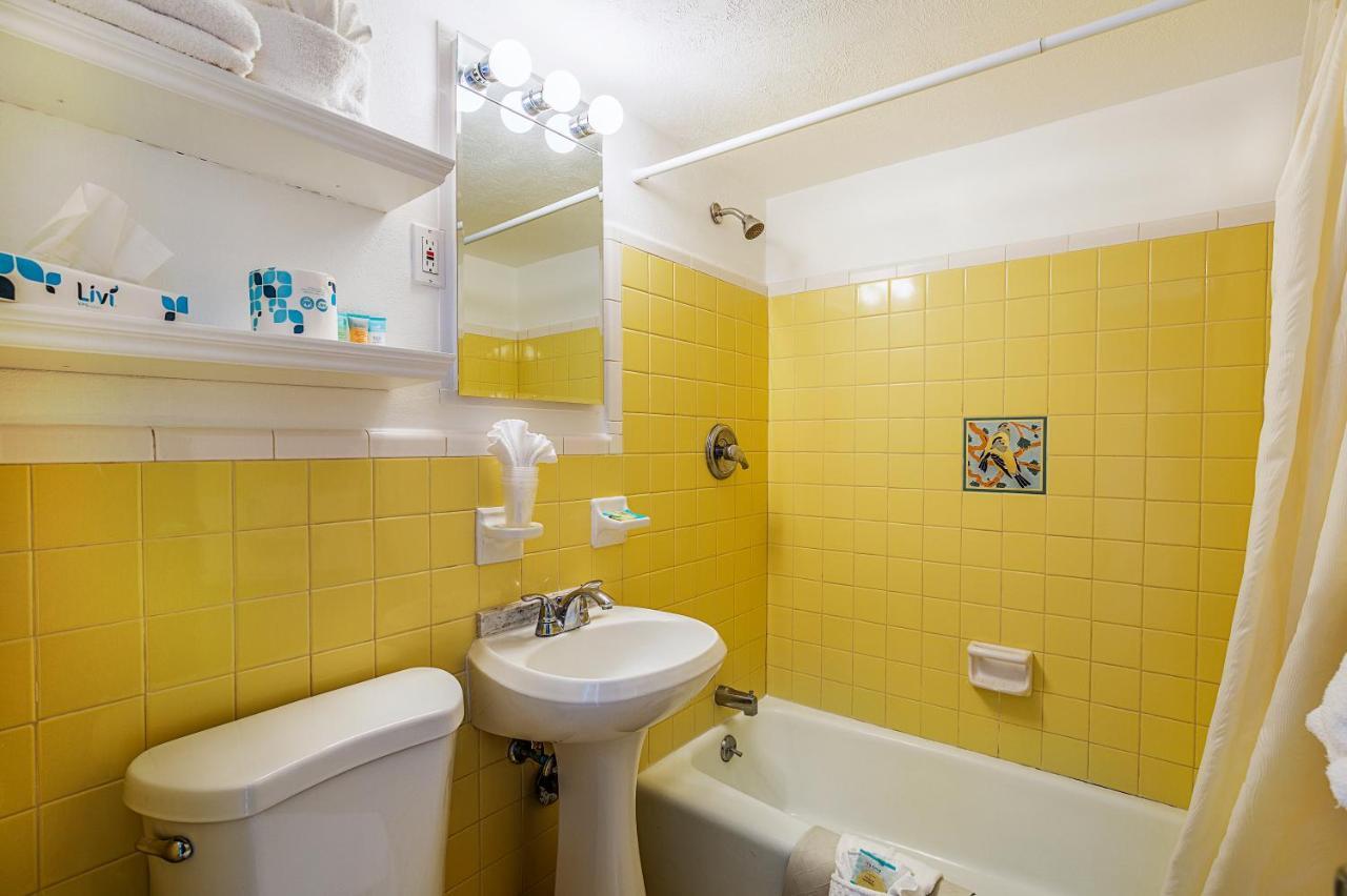 One Bedroom Suite with Two Queen Beds Efficiency and Partial Ocean View